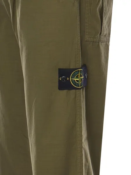 Pantaloni Stone Island cu strasuri verde