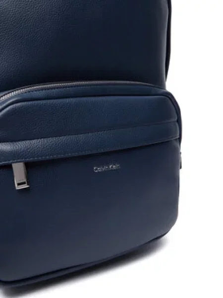 Cestovný batoh Calvin Klein Raised Round Backpack Tmavomodrá