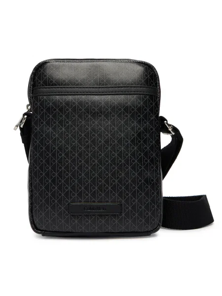 Geantă crossover Calvin Klein Emblem Aop Coated Slim Reporter negru