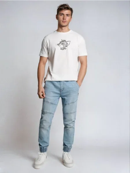 Sinsay Jeansy jogger z efektem sprania niebieski