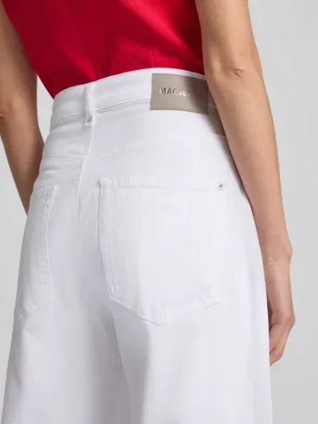 Jeansy o kroju baggy fit z nakładanymi Mac białe