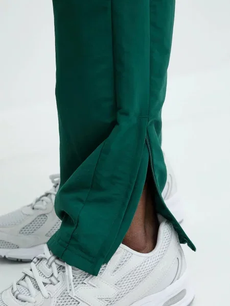 Спортивні штани adidas Originals Track Pant з аплікацією зелений