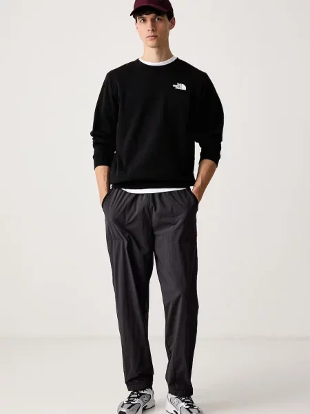 The North Face pulover z bombažem Evolution črna