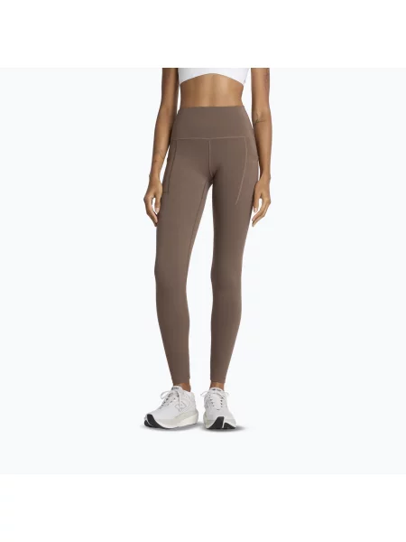 Běžecké legíny New Balance Sleek Pocket High Rise cortado béžové