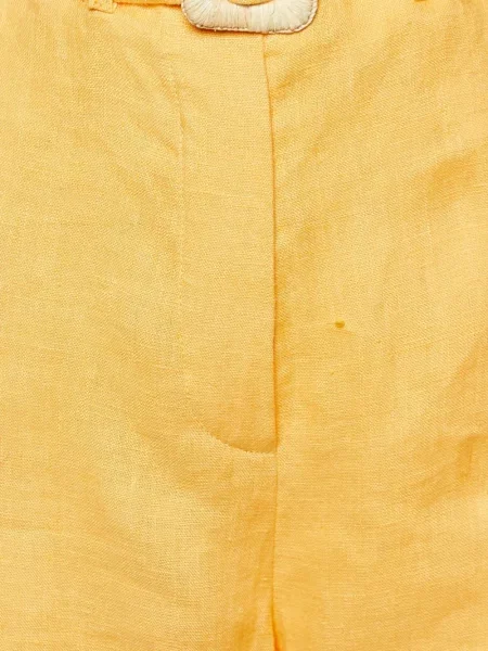 Pantaloni Nanushka de in galben