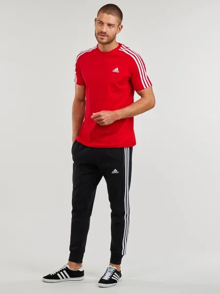 Csíkos frottír melegítőnadrág Adidas Sportswear fekete
