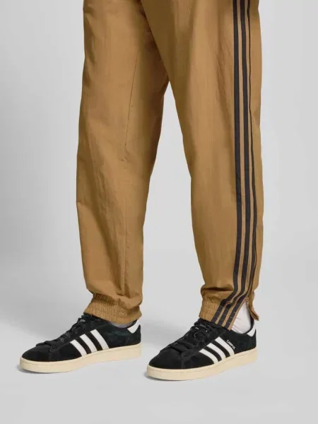 Spodnie dresowe z elastycznym ściągaczem Adidas Originals beżowy