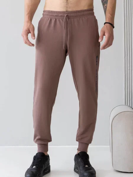 Брюки коричневі