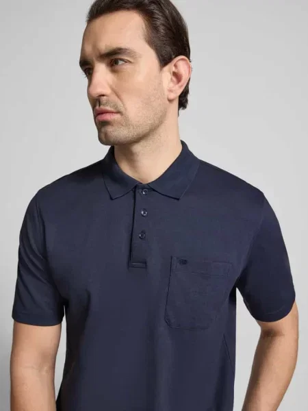 Koszulka polo o kroju regular fit z brustaszą Christian Berg Men granatowa