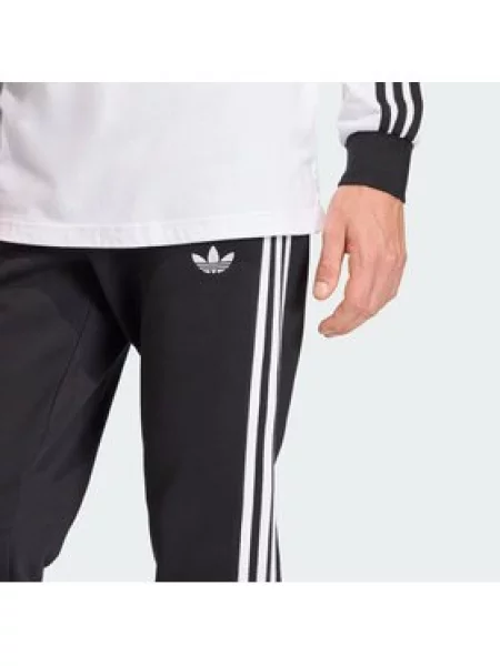 Hlače Adidas s črtami črna