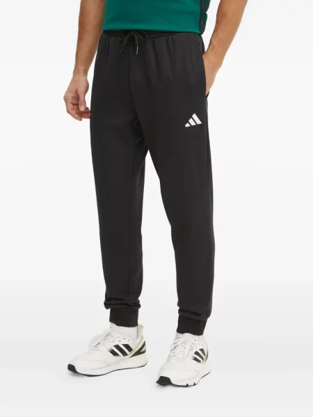 Kalhoty Adidas s potiskem šedé