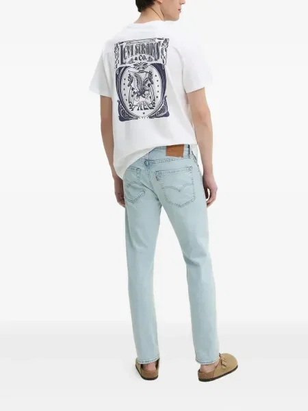 Proste jeansy Levi's 501 w paski ze stretchu dzwony niebieskie