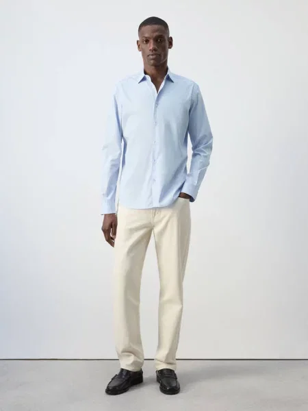 Koszula regular fit w paski Mężczyzna XS MANGO MAN błękitny