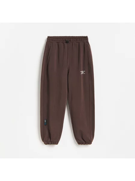 Reserved kalhoty joggers tmavě hnědá