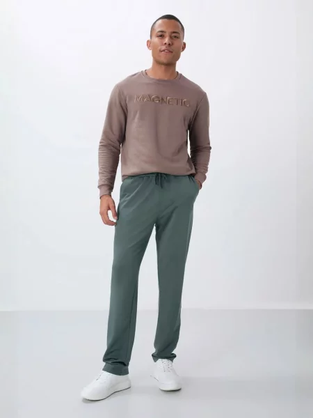 Tommy Life Športne hlače Jogginghose temno zelena