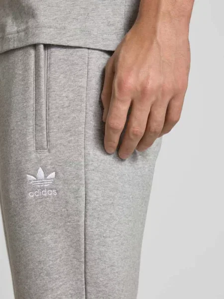 Spodnie dresowe z elastycznym pasem i wpuszczanymi Adidas Originals
