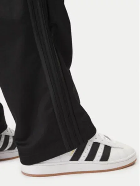 Adidas Spodnji del trenirke adicolor črna