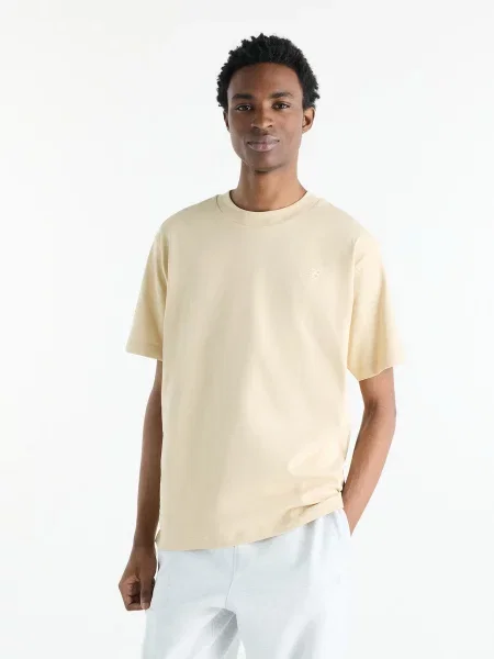 Футболка New Balance бежевий