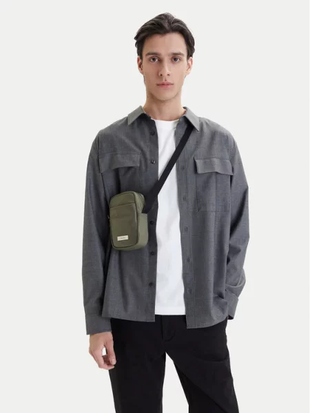 Crossover torbica Calvin Klein Sleek Slim Reporter zelena