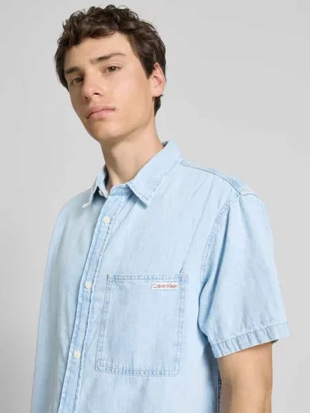 Koszula jeansowa z kołnierzykiem typu kent Calvin Klein Jeans niebieska