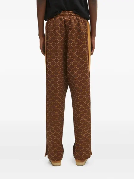 Pantaloni A Bathing Ape® cu dungi cu imagine maro