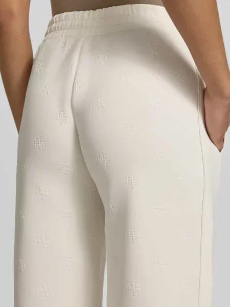 Spodnie dresowe o kroju wide fit z nadrukiem logo allover model Calista' Guess Activewear białe