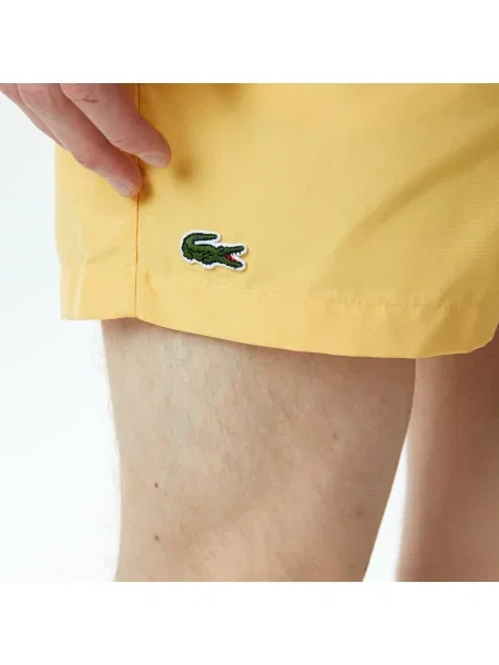 Шорты Lacoste желтые