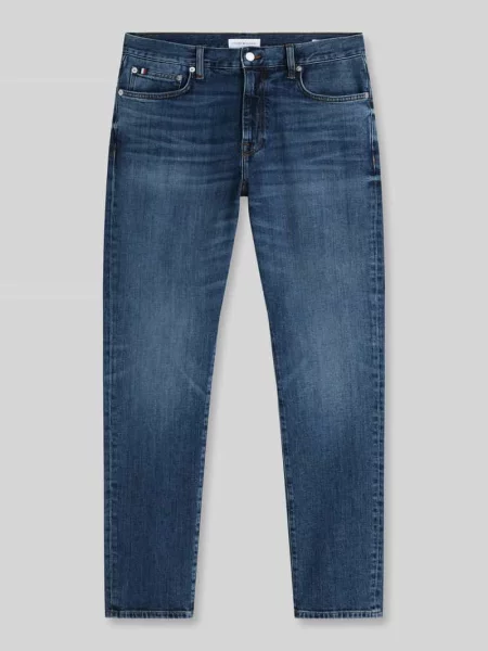 Jeansy o kroju straight fit z mieszanki bawełny Tommy Hilfiger niebieskie