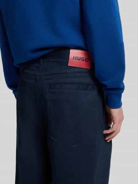 Spodnie o kroju baggy szerokość z czystej bawełny model HUGO niebieskie