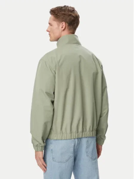 Tommy Jeans Prechodná bunda ESSENTIAL pastelovo zelená