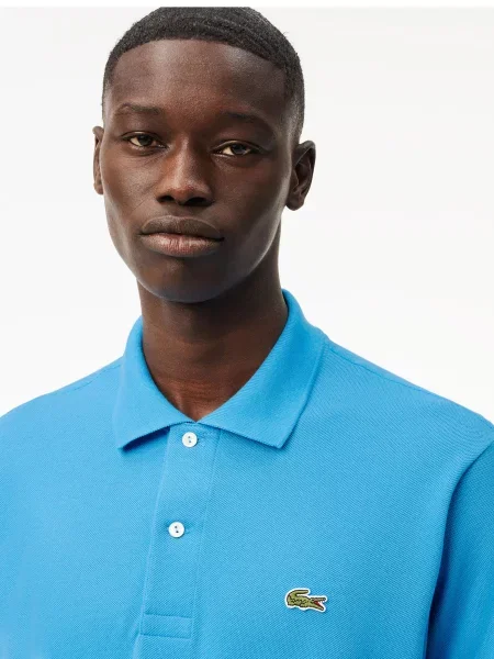 Поло Lacoste голубое