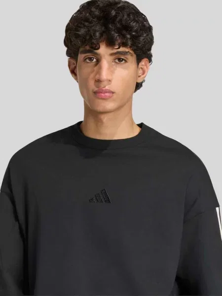 Bluzka z długim rękawem o kroju relaxed fit z czystej bawełny Adidas Sportswear czarna