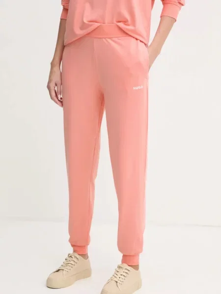 HUGO spodnie lounge gładkie pomarańczowy