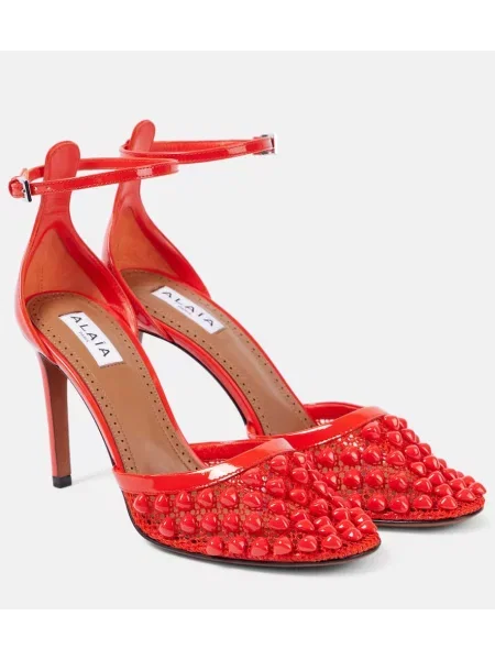 Usnjene salonarji Alaia z žeblji oranžna