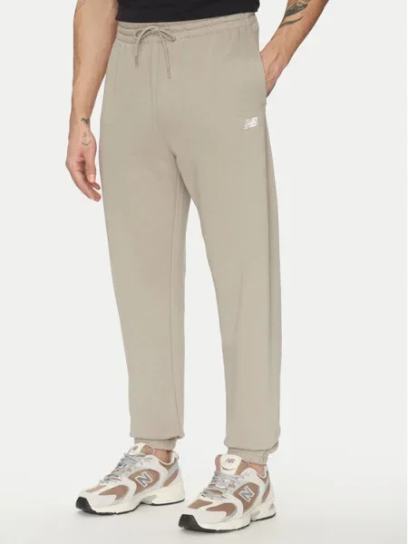 New Balance Долнище анцуг Essentials бежов