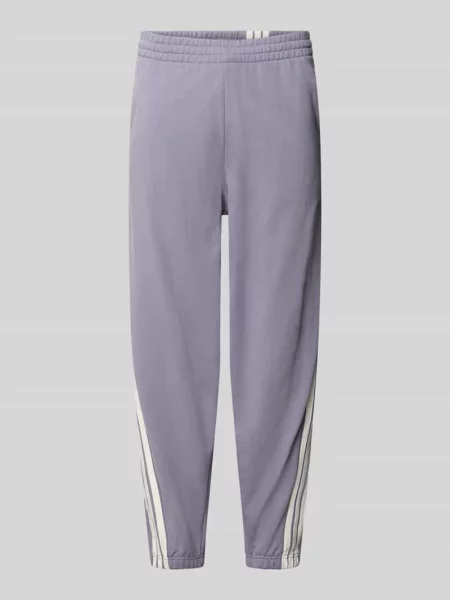 Spodnie dresowe o kroju regular fit z czystej bawełny Adidas Sportswear fioletowe