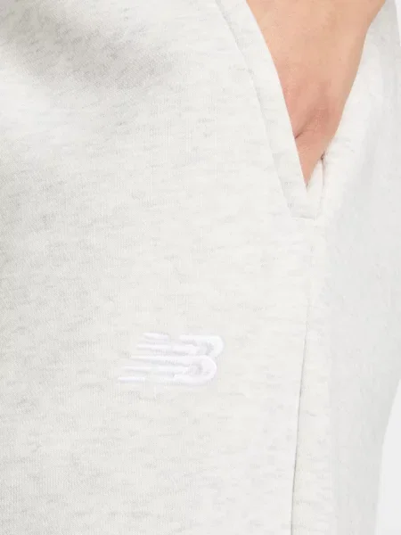 Маленькие брюки New Balance белые