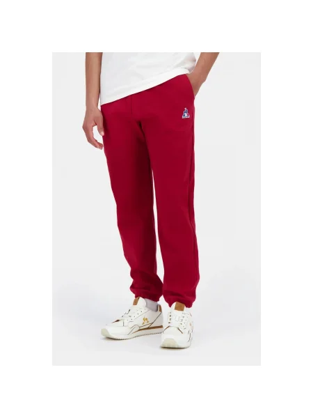 Pantaloni Le Coq Sportif roșu