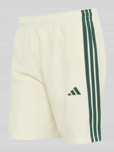 Szorty dresowe o kroju regular fit z rozcięciem z boku Adidas Sportswear białe