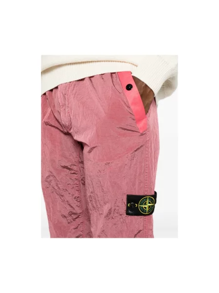 Spodnie dresowe Stone Island z kamieniami różowe