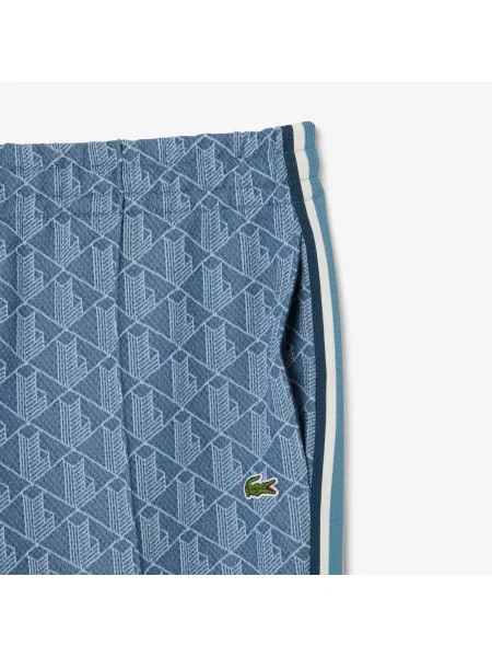 Lacoste Spodnie Dresowe Z Monogramem Paris niebieskie