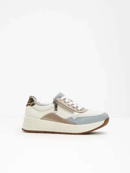 Wygodne sneakersy marki Rieker na podeszwie platformie w wygodnej tęgości białe
