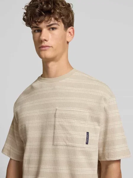 T-shirt z kieszenią na piersi Calvin Klein Jeans beżowa