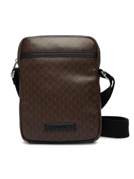 Calvin Klein Geantă crossover Emblem Aop Coated Slim Reporter maro
