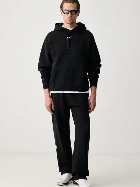 Nike Sportswear NOCTA spodnie dresowe z bawełną