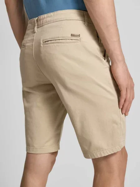 Bermudy o kroju regular fit z wpuszczanymi model ‘IBOWIE’ Jack & Jones beżowe