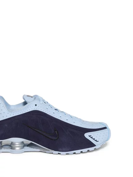 Sneakerși Nike din piele cu perforații maro