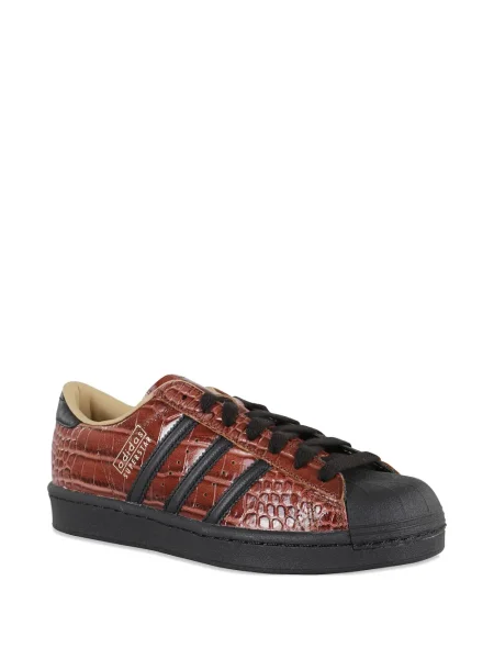 Pantaloni Adidas din fleece cu dungi albastru