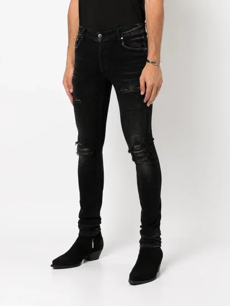 Skinny jeansy skinny Amiri z przetarciami czarne