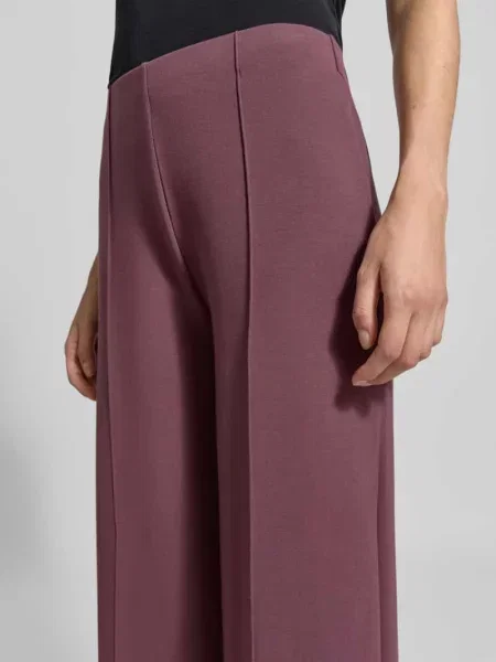 Spodnie o kroju wide fit z ozdobnymi szwami Christian Berg Woman